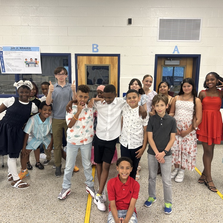 Ms. Williams class smiling together in the cafeteria