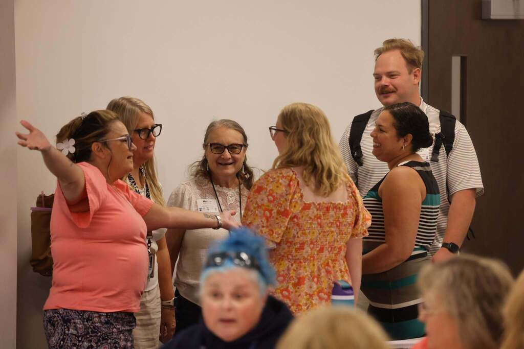 Educators in a breakout session working together.