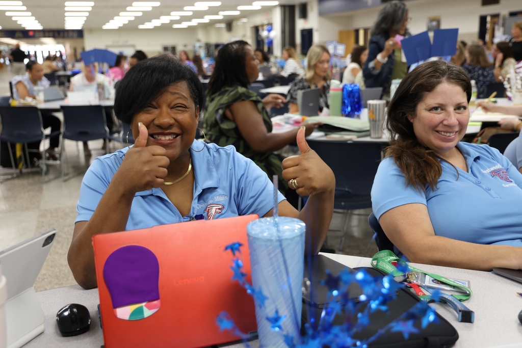 Principal and her team happy to be working at LaunchPad. 