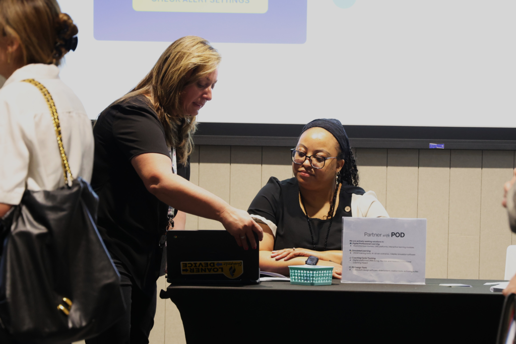 CPS Employees converse with outside vendors at the Job vendor fair
