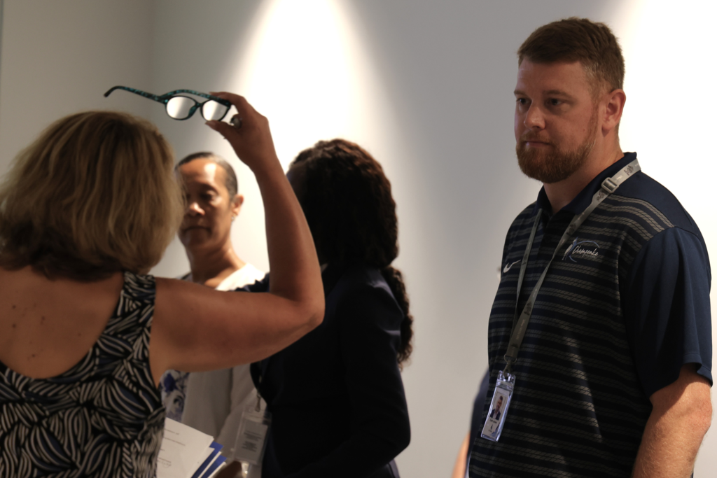 CPS Employees converse with outside vendors at the Job vendor fair