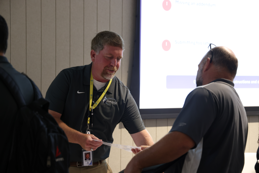 CPS Employees converse with outside vendors at the Job vendor fair