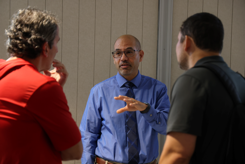 CPS Employees converse with outside vendors at the Job vendor fair