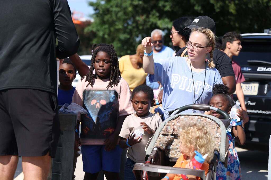 families arrive at event