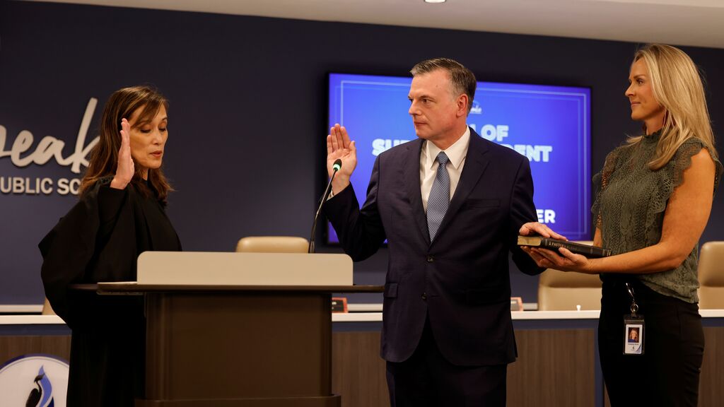 Dr. Brubaker performing the oath of superintendent, accompanied by Chair Kim Scott and administered by Judge Bryant of the Chesapeake Circuit Court