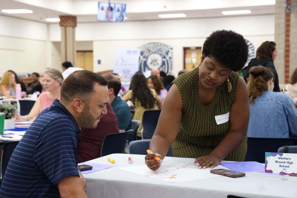 two new teachers collaborate on project