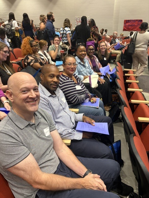 Our new teachers in the auditorium at the New Teacher Orientation