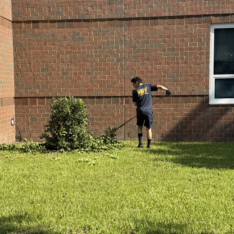 military member raking