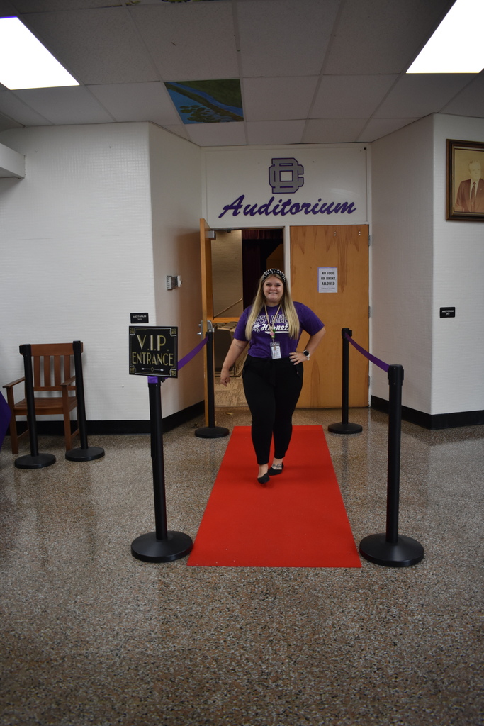 Teacher walking the red carpet