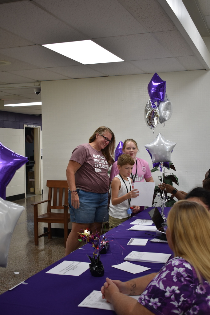 Families arriving to open house