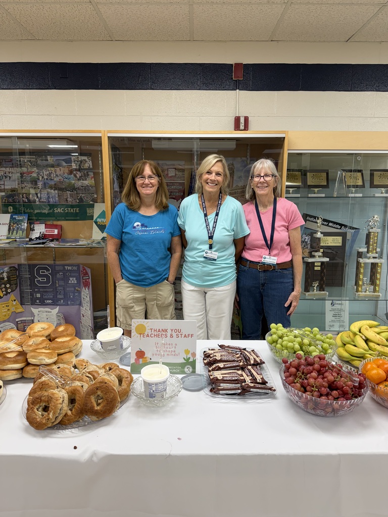 three people from river oak church serving a breakfast buffet for staff at IRMS