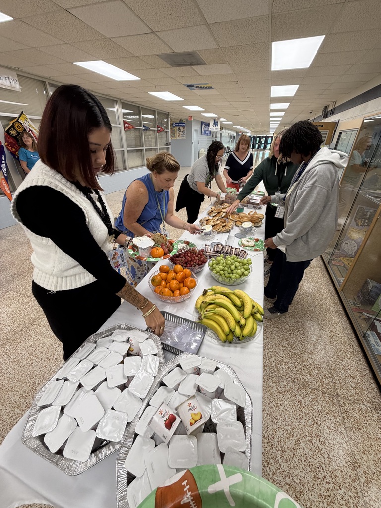 teachers enjoying a breakfast spread from a local church