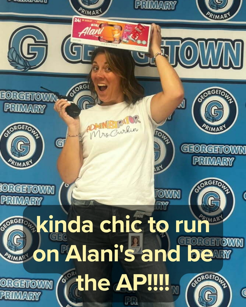 Mrs. Gurkin posing with her Alani drinks - kinda chic to run on Alani's and be the AP!!!!