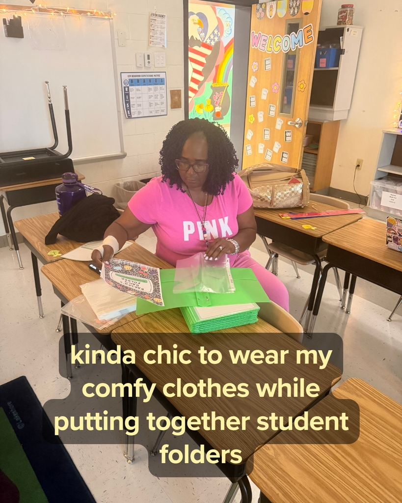 Mrs. Cherry preparing student folders - kinda chic to wear my comfy clothes while putting together student folders