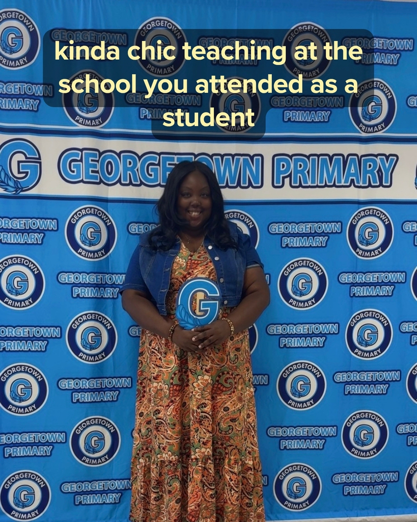 Ms. Hunter posing with the Georgetown logo - kinda chic teaching at the school you attended as a student