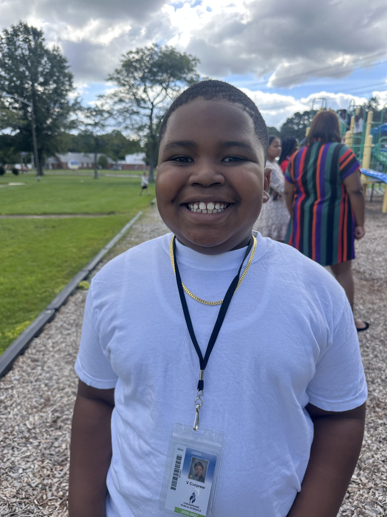 student smiling on the playground