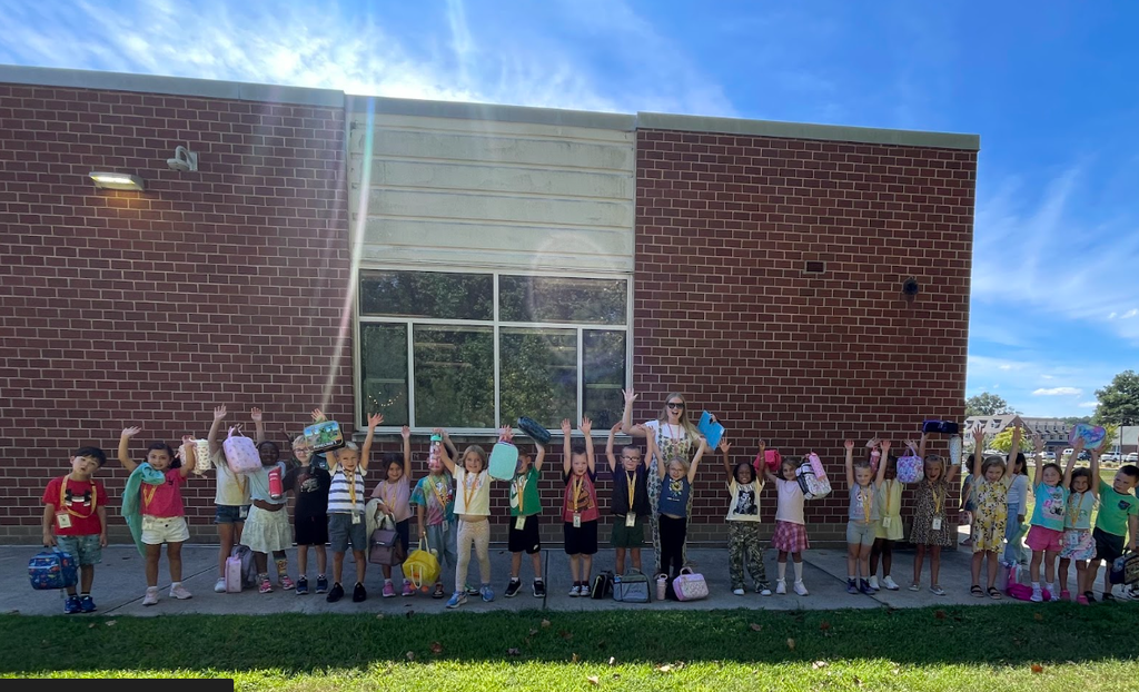 Mrs. Jennings class posing excitedly on the first day of school