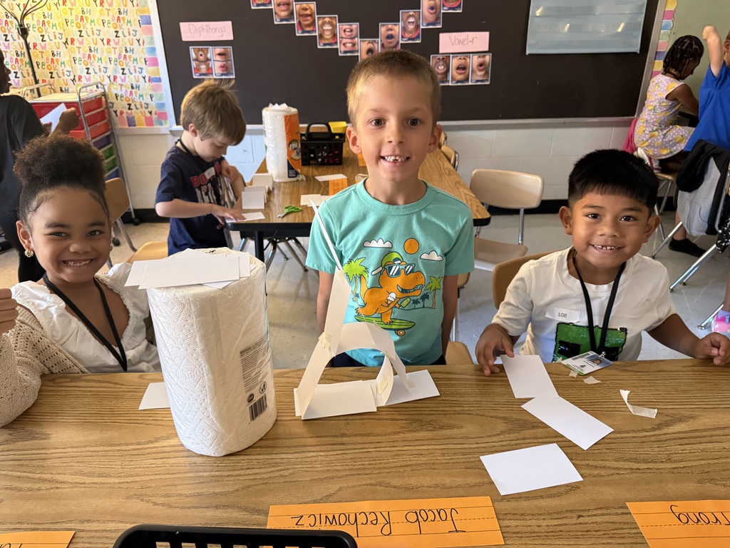 Students work together to build a structure