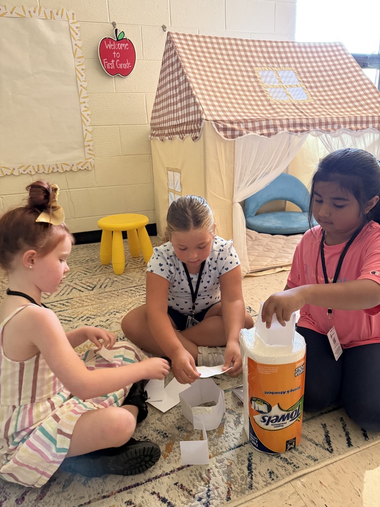 Students work together to build a structure