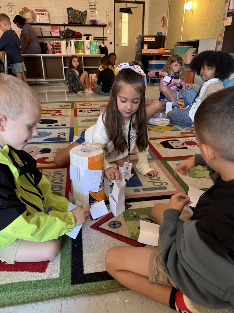 Students work together to build a structure