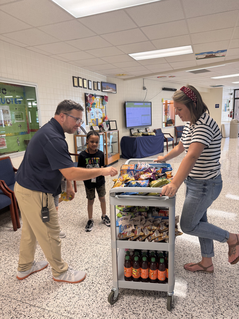 staff chooses snack from cart