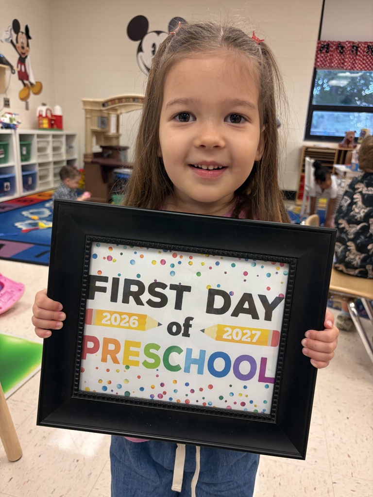 Preschool student excited on first day of school