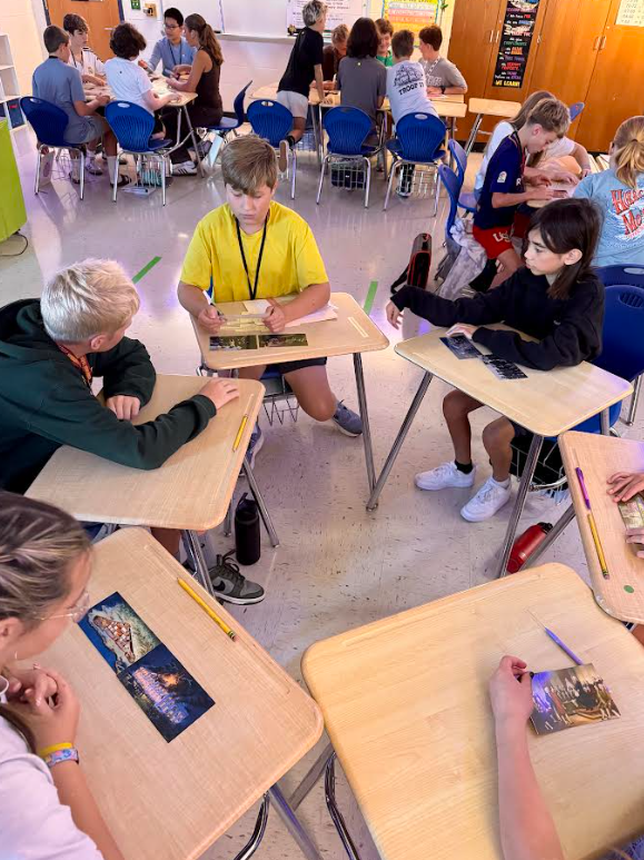 Students work to uncover clues about images from US History.