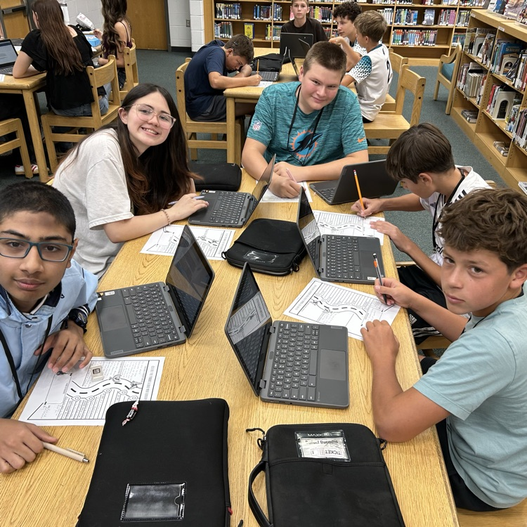 students researching in the library