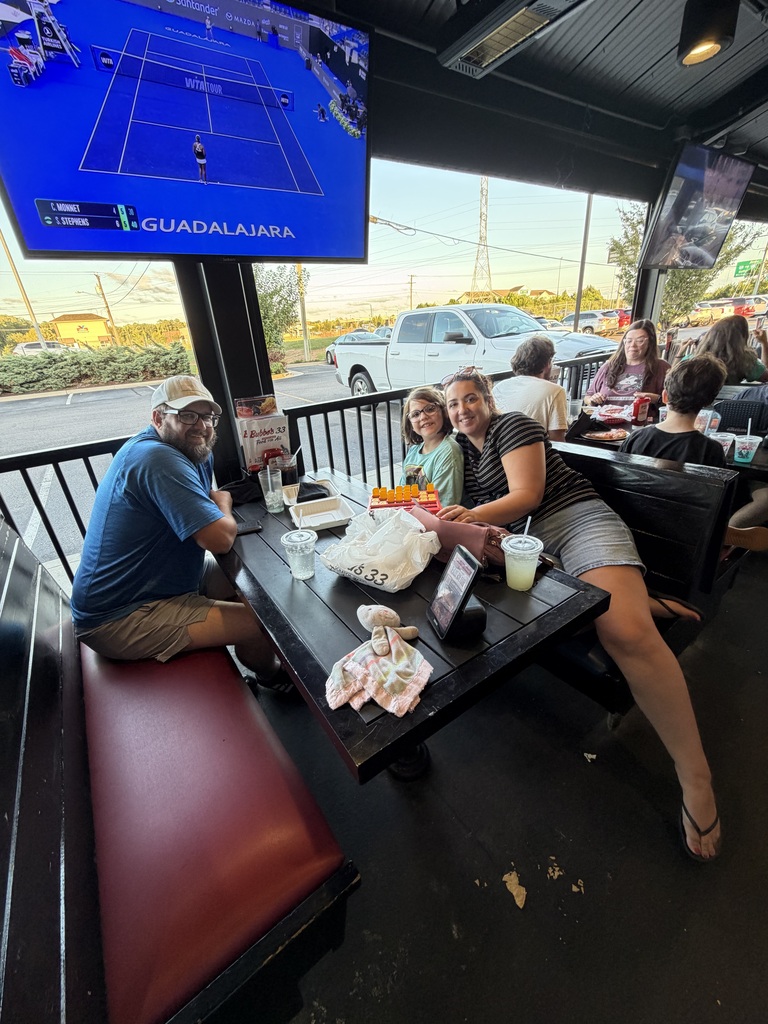 family enjoying dinner at Bubba's 33