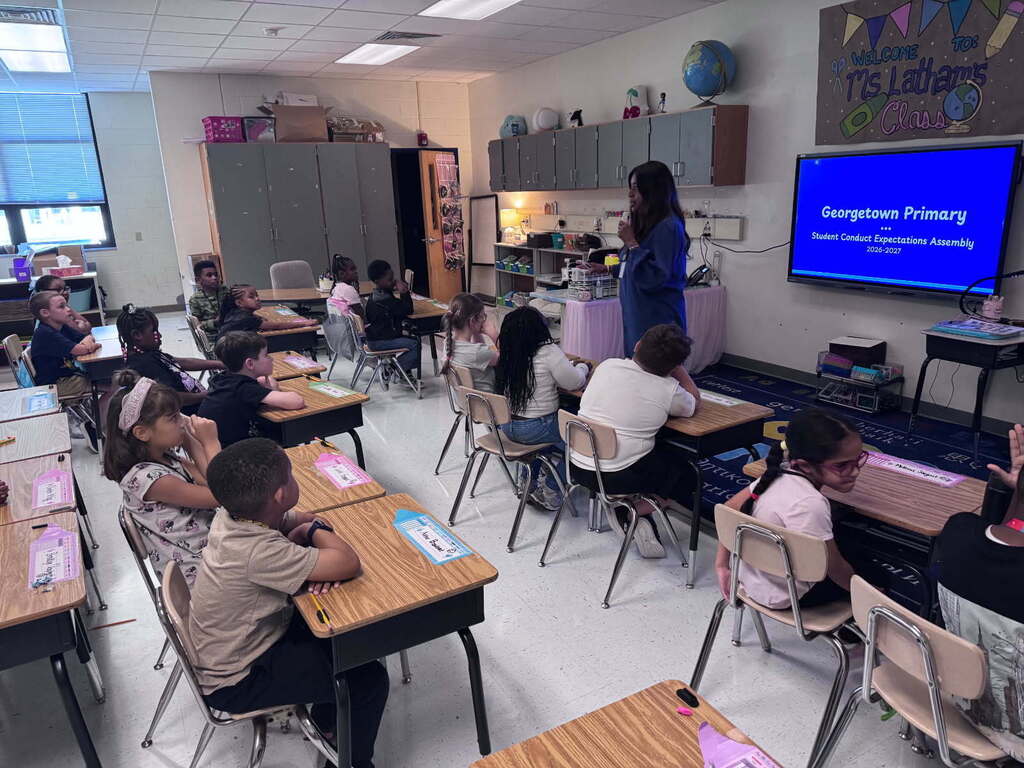 Principal Alexander speaking to second grade students