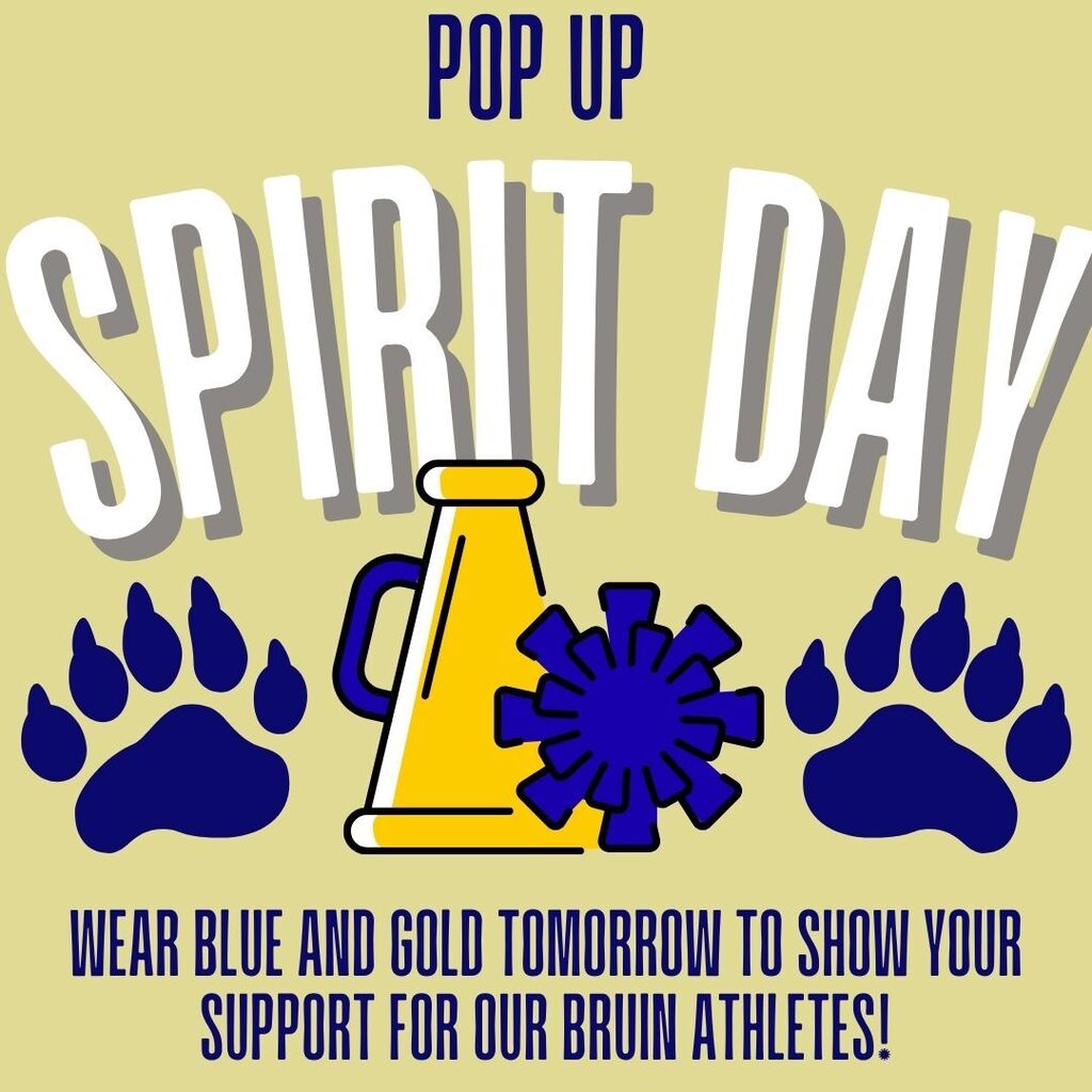 A light gold digital graphic with dark blue text at the top that reads POP UP SPIRIT DAY. In the center are two dark blue bear paw prints framing a yellow cheer megaphone with a blue handle and a blue pom-pom. At the bottom, dark blue text reads WEAR BLUE AND GOLD TOMORROW TO SHOW YOUR SUPPORT FOR OUR BRUIN ATHLETES! The graphic has an energetic, celebratory tone promoting school spirit.