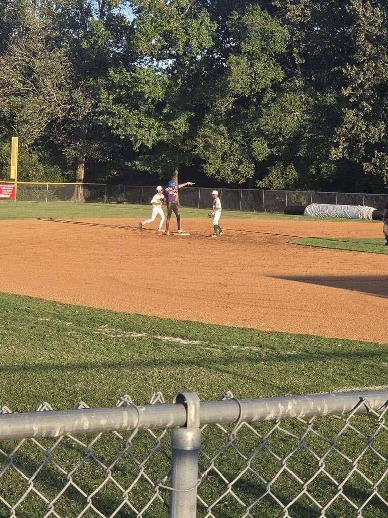 Boys playing baseball for DCMS