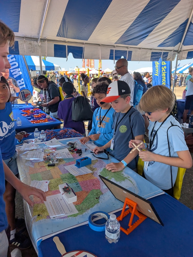 students mapping directions at the airshow
