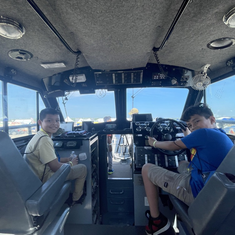 5th grade boys in the cockpit.