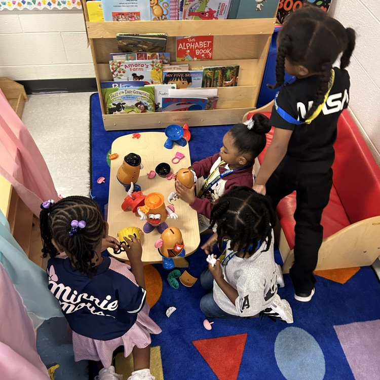 Students playing with Mr. Potato Head!