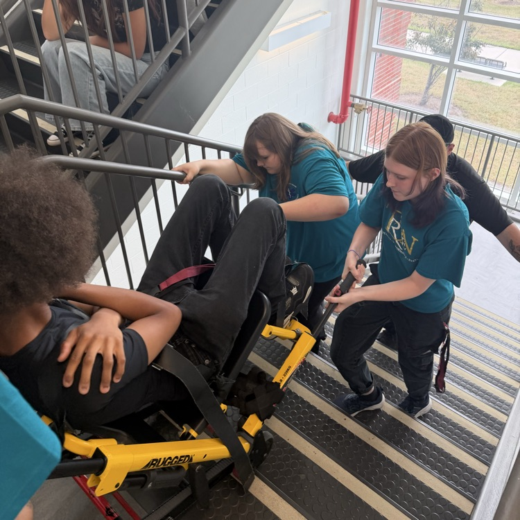 emt students practicing skills
