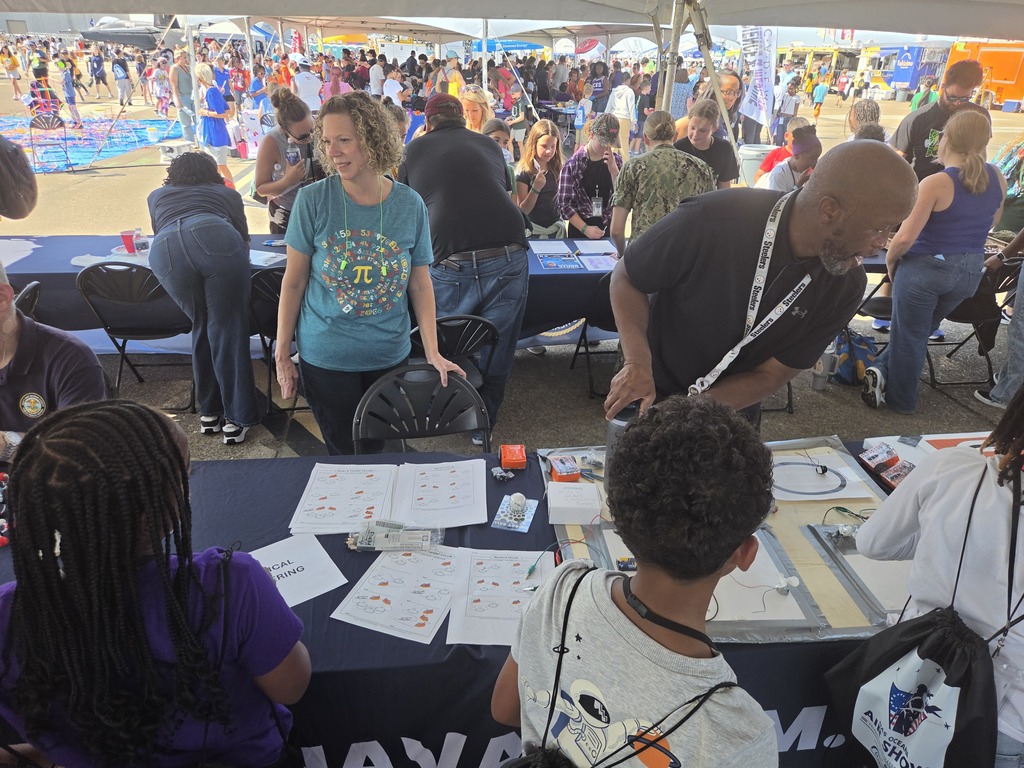 students engaged at NAS Oceana Air Show with STEM vendors