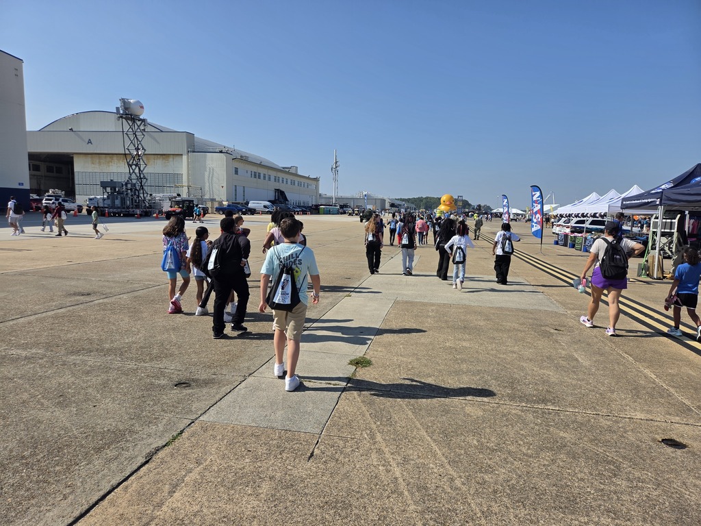 students walking on the air strip at NAS Oceana Air Show
