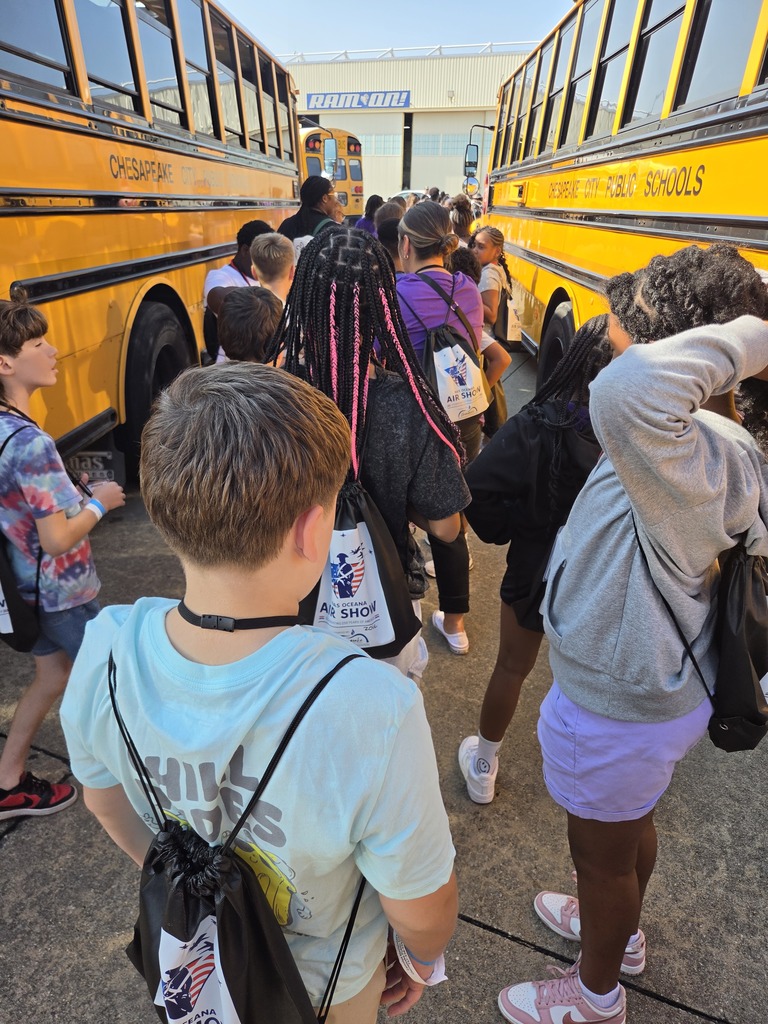 students waiting near the buses