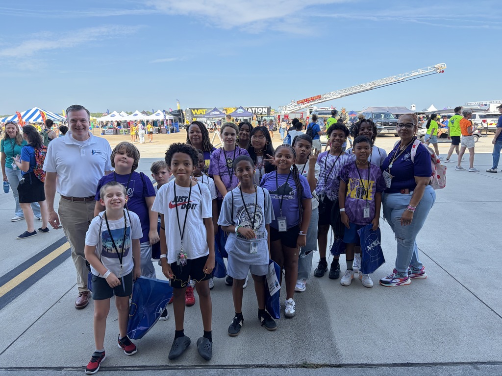 5th grade students posing with new Superintendent at NAS Oceana Air Show