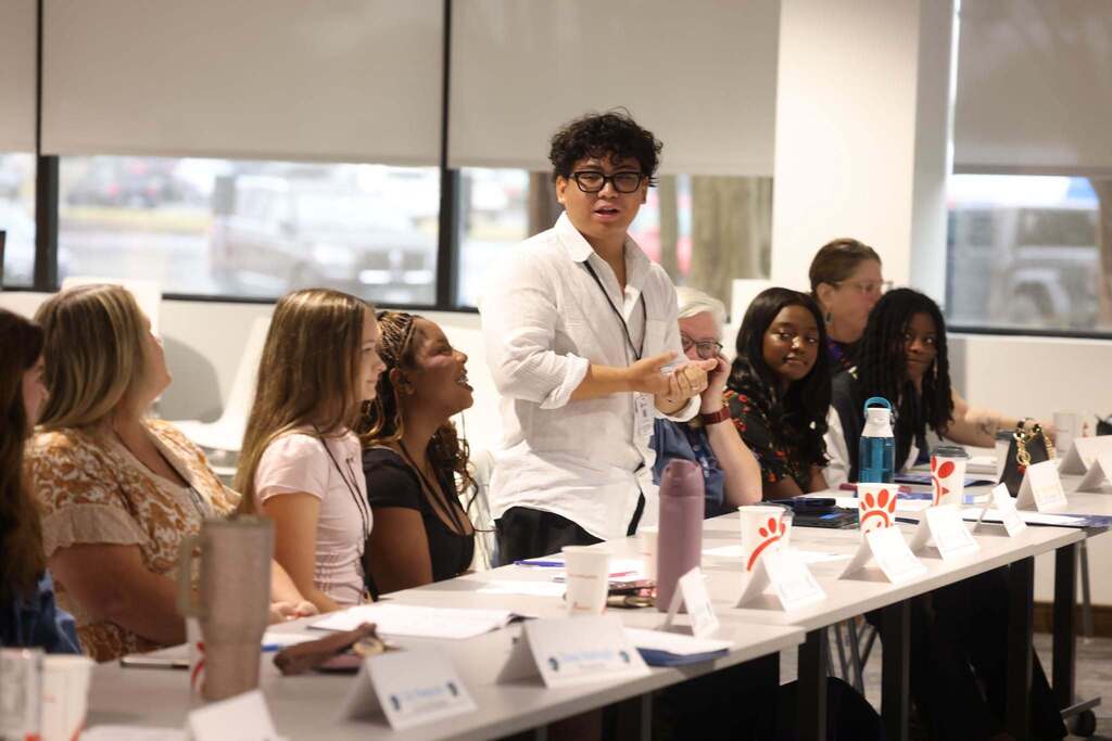 SCA member speaking with the group.