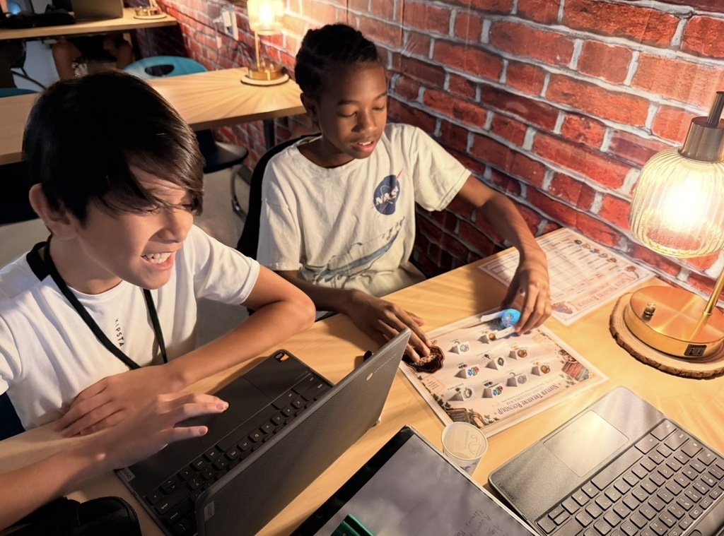 students happily working on the challenge