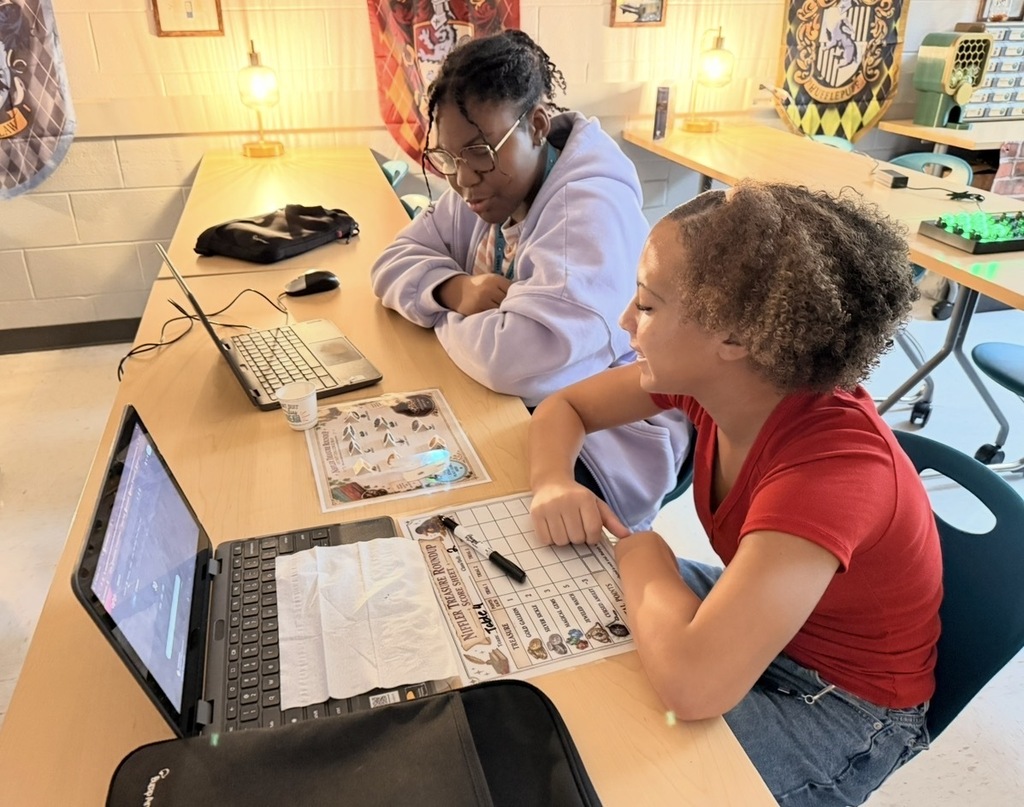 students happily working on the challenge