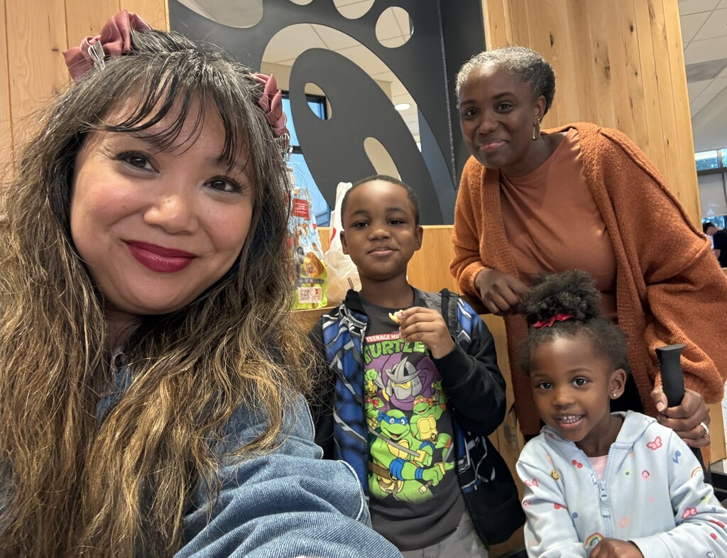 Two woman and two young children at Chick-fil-a fundraiser