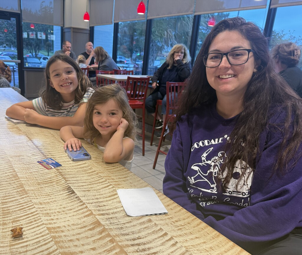 Woman and two girls at chick-fil-a