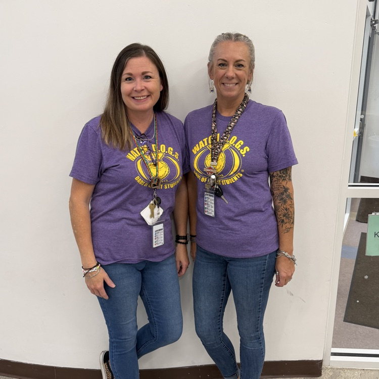 Our two Watch Dog program leaders, Holly Pennington and Jenn Scott standing together proudly at pizza night as we kick off another year of the program.