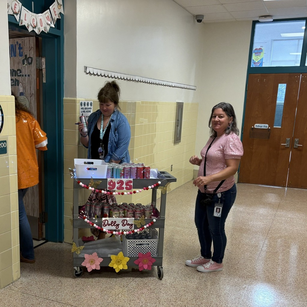 admin passing out treats to staff