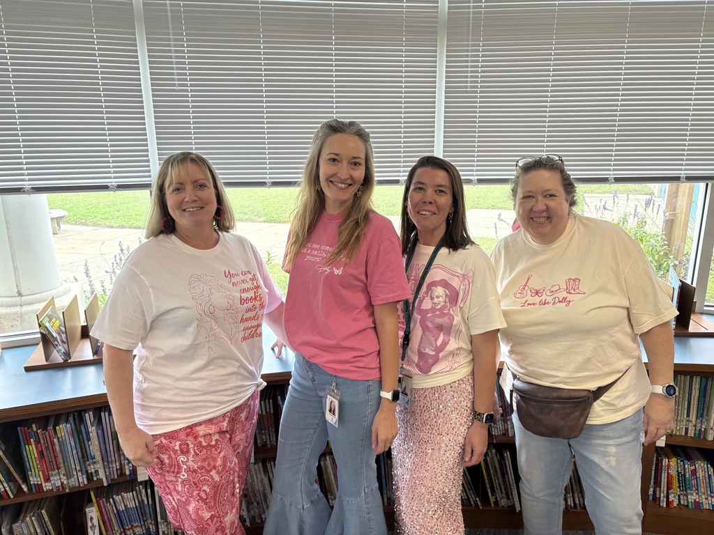 staff dressed u p for Dolly day