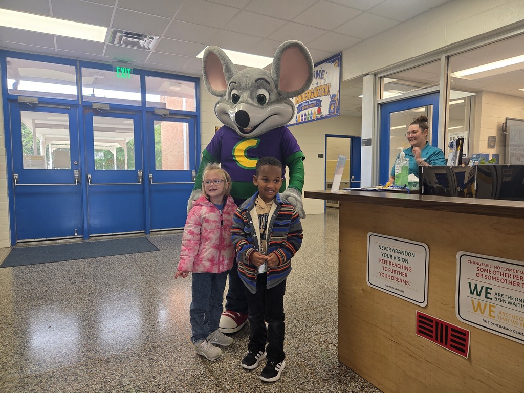 Students with Chuck E Cheese.