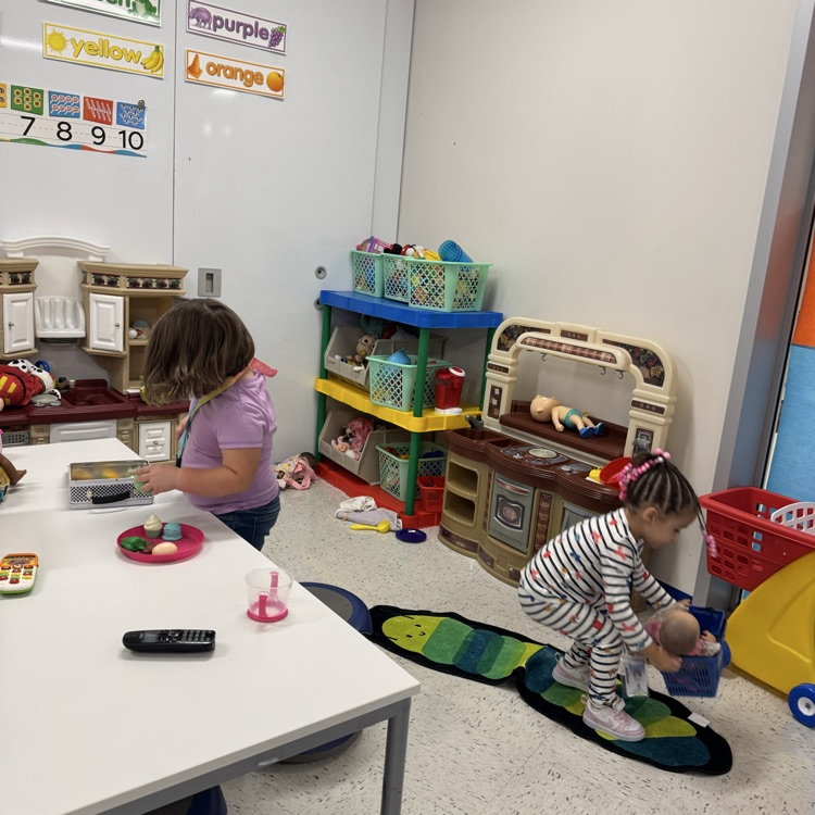 Students playing in preschool